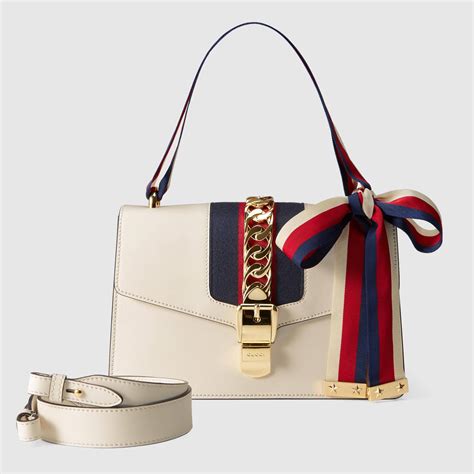 gicci purse|white gucci shopping bag.